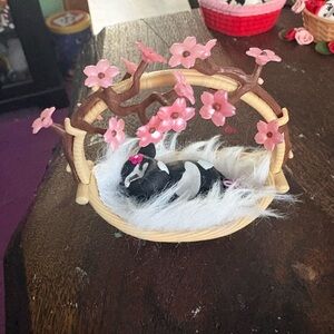 Newborn cow in Basket with Pink Flowers